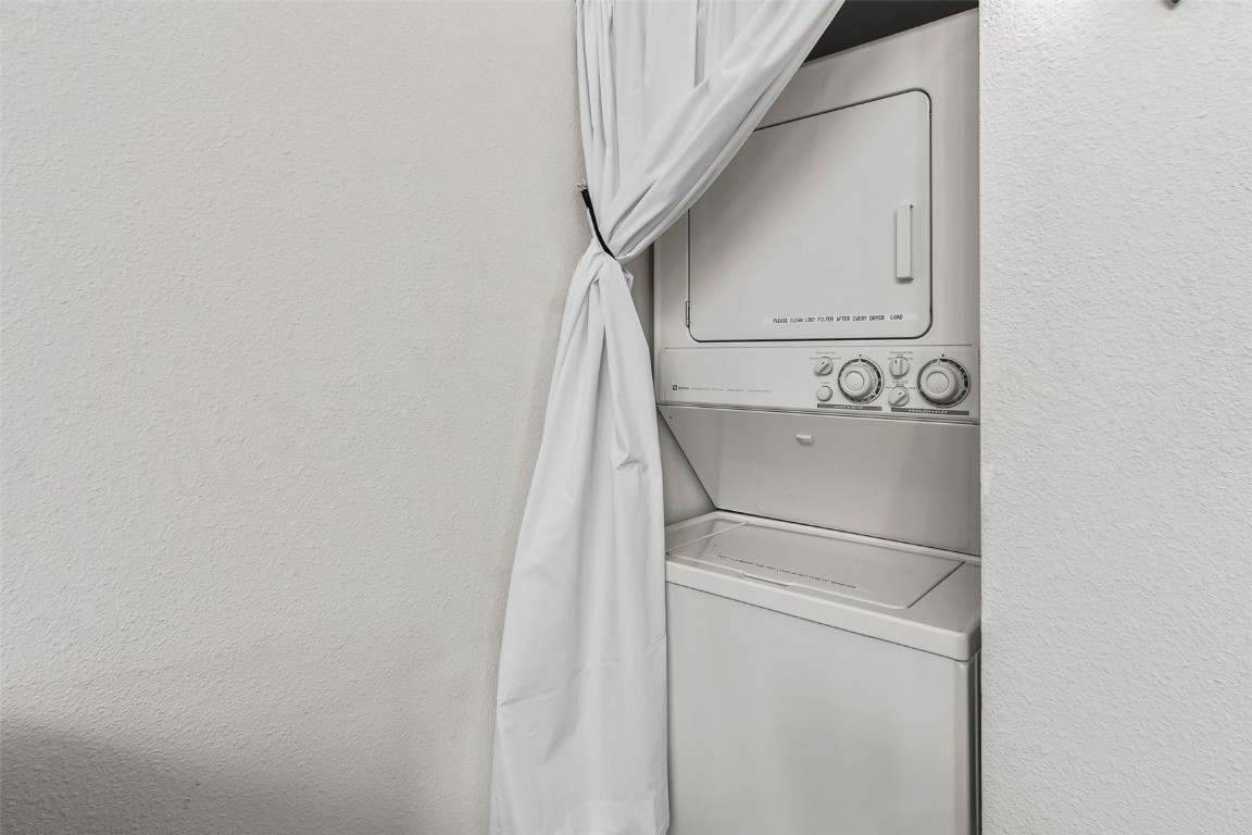 9430 Ryan Gulch Road, Unit 9453 Silverthorne, CO 80498 - Photo 18 of 28 a utility room with dryer and washer