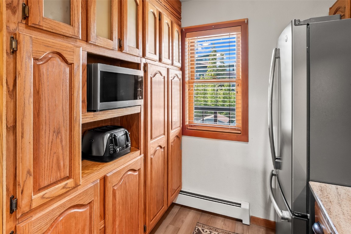 9430 Ryan Gulch Road, Unit 9453 Silverthorne, CO 80498 - Photo 9 of 28 a view of a storage and utility room in a kitchen