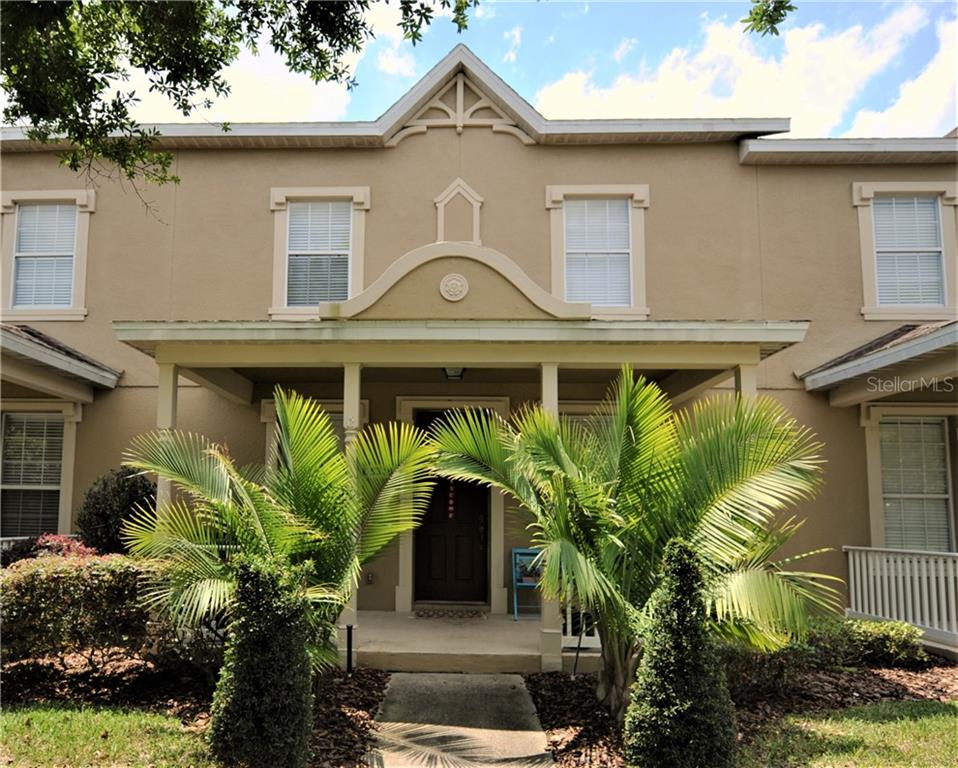 5318 Segari Way Windermere, FL 34786 - Photo 1 of 1 a front view of a house with plants