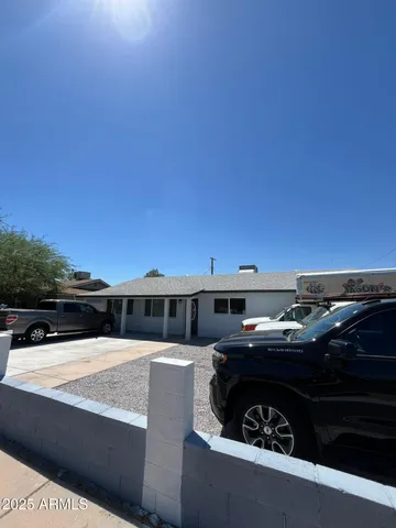 a view of a swimming pool with a lounge chair