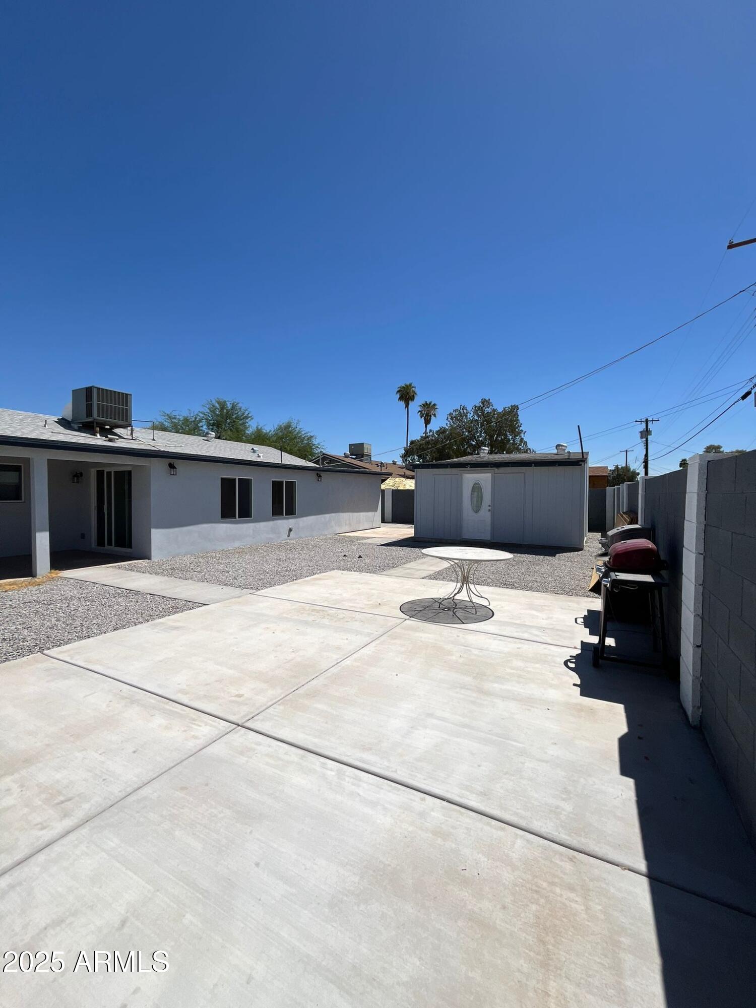 3639 West Lawrence Lane Phoenix, AZ 85051 - Photo 23 of 28 a view of a house with a garage