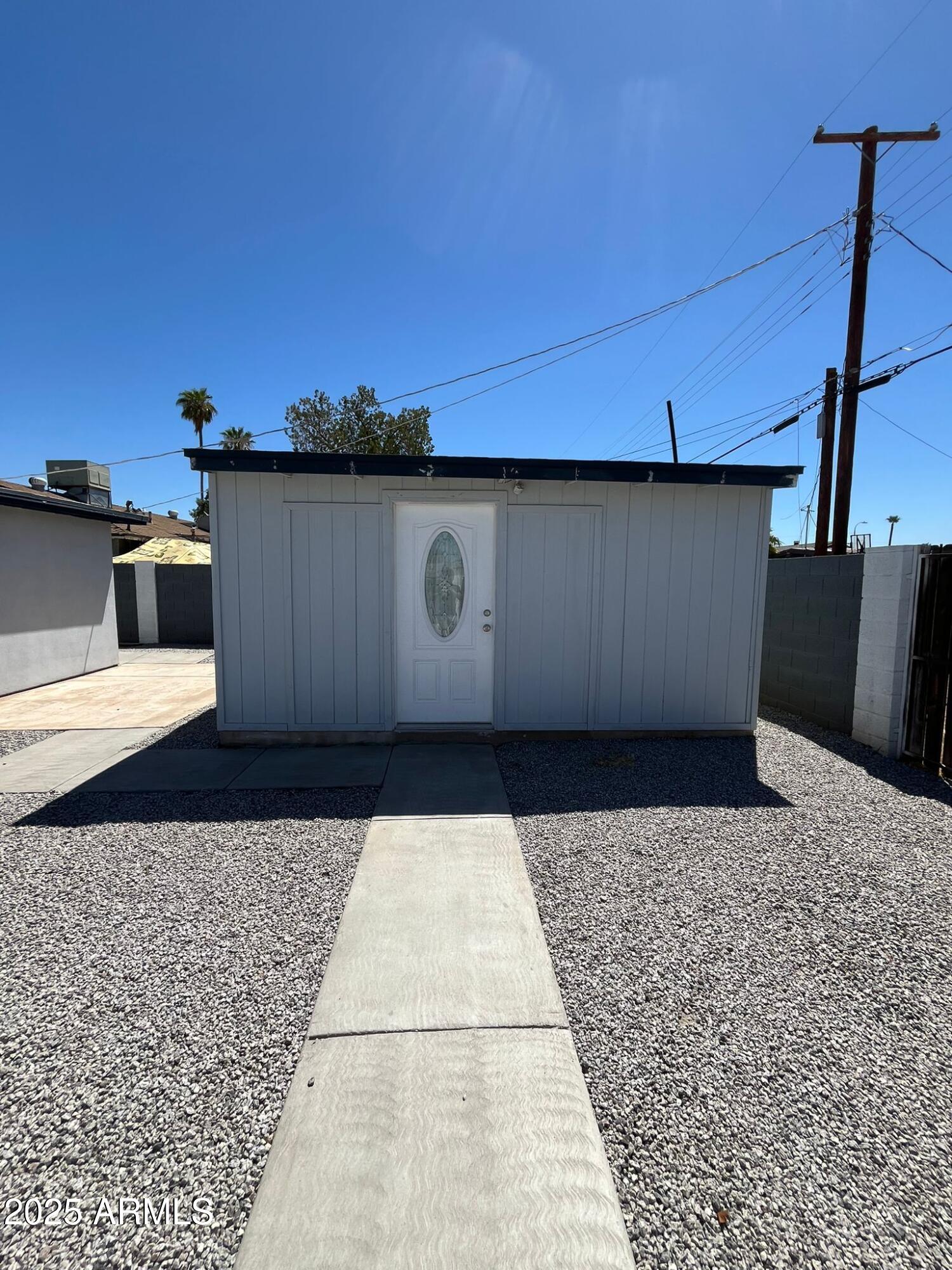 3639 West Lawrence Lane Phoenix, AZ 85051 - Photo 24 of 28 a black and white building