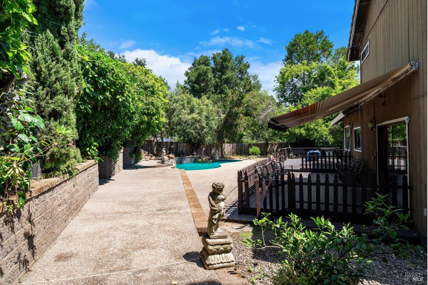 715 Placer Court Santa Rosa, CA 95401 - Photo 23 of 37 a view of a backyard with plants and patio