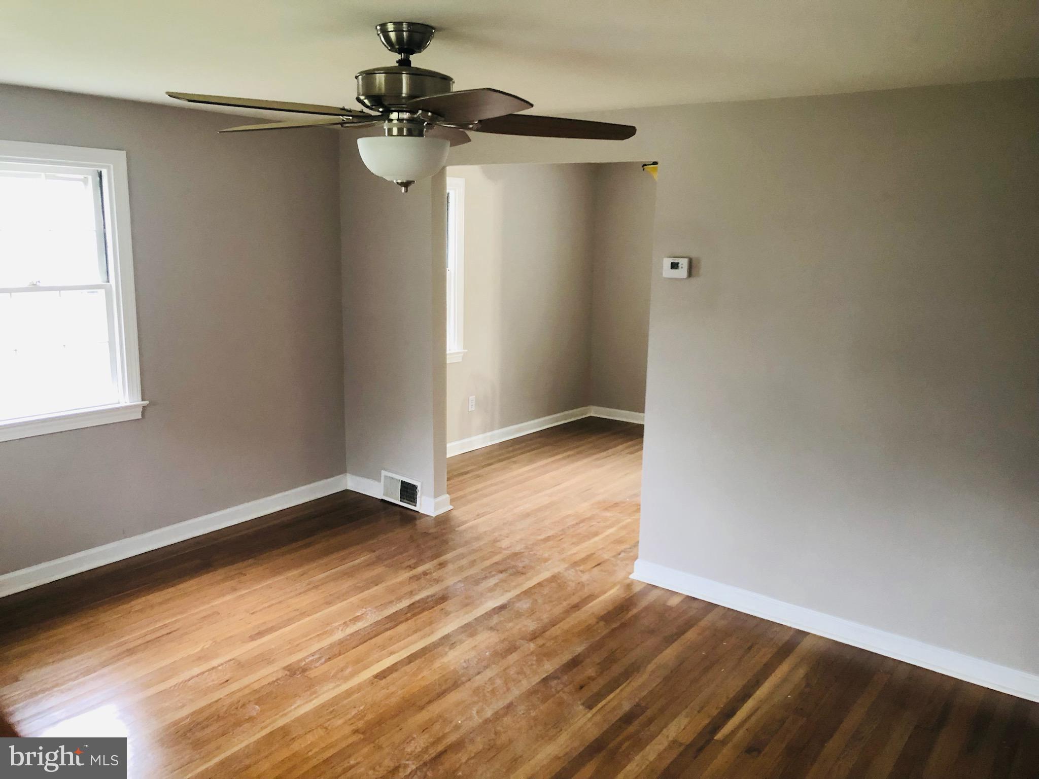 413 Holmes Road Morton, PA 19070 - Photo 2 of 13 living room into dining room