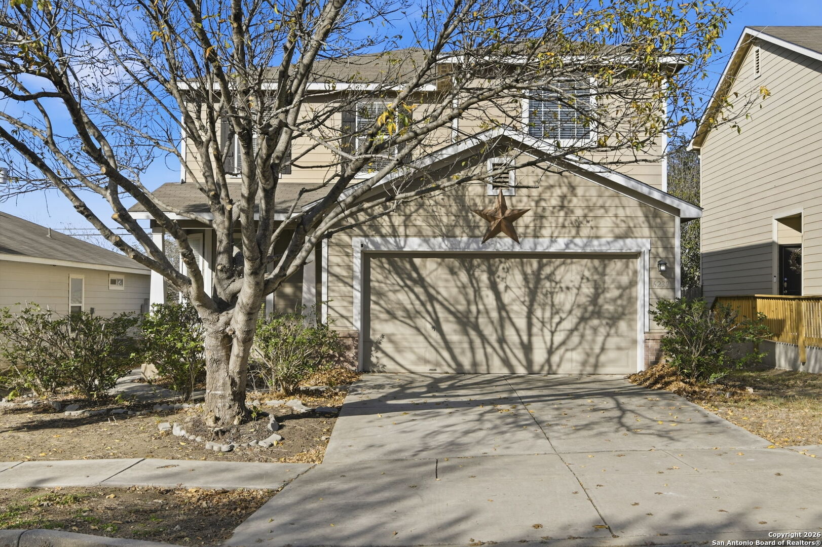 a street view with wooden fence