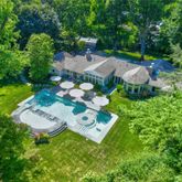 an aerial view of residential house with outdoor space