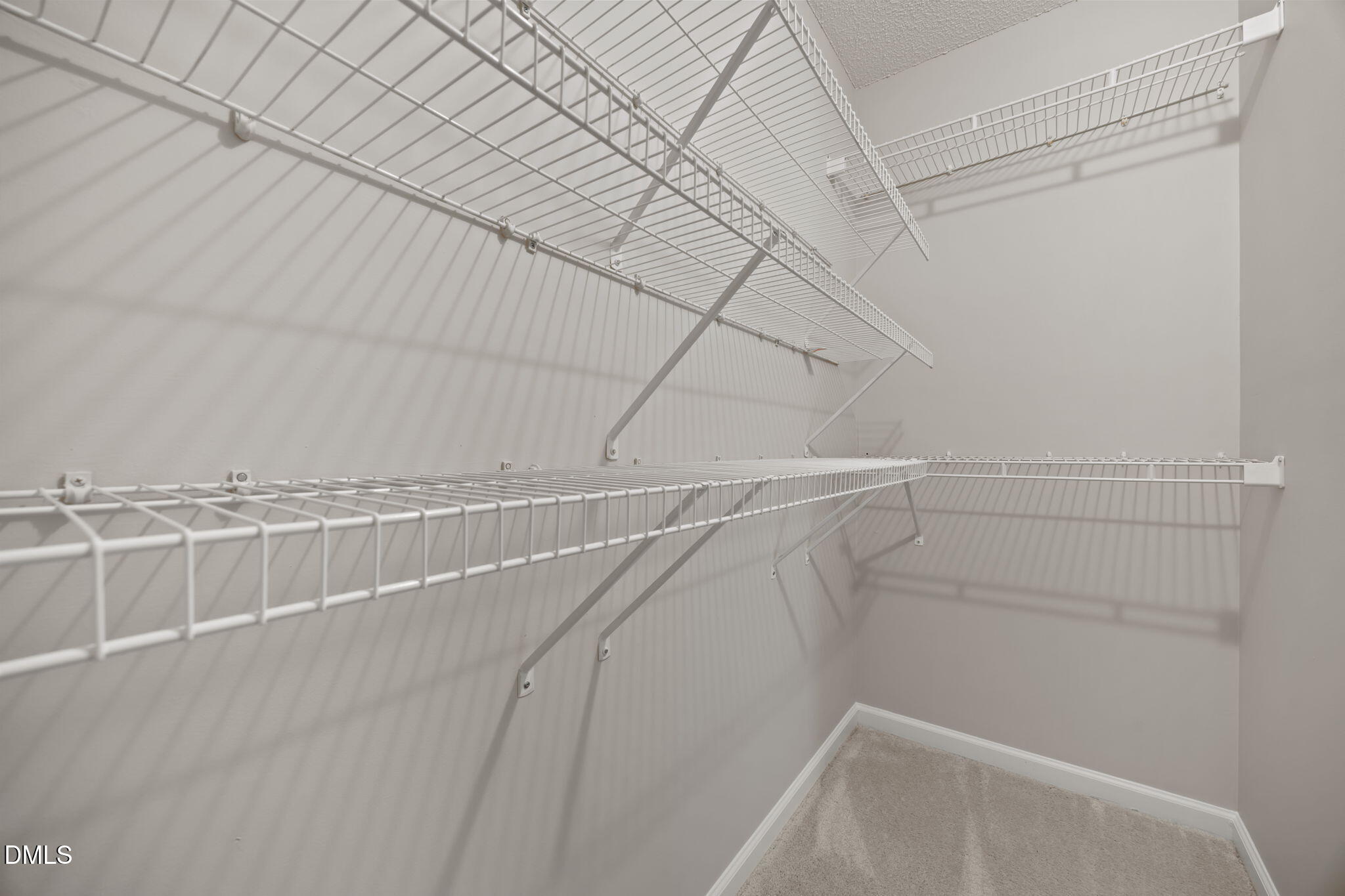 40 Circle Tree Lane Angier, NC 27501 - Photo 24 of 39 a view of a room with racks on the wall