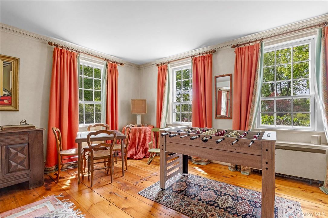 1282 Hollow Road Clinton Corners, NY 12514 - Photo 11 of 34 a living room filled with furniture and a large window