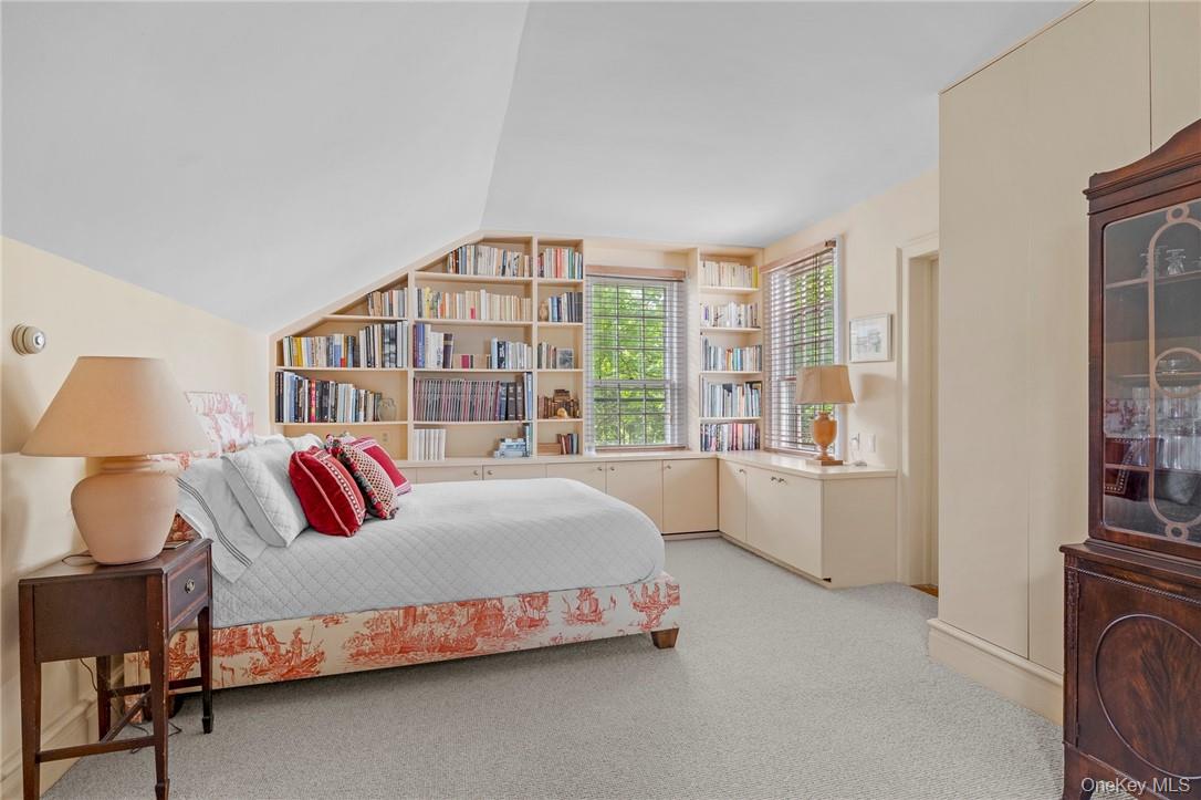 1282 Hollow Road Clinton Corners, NY 12514 - Photo 15 of 34 a bedroom with a bed and a large window