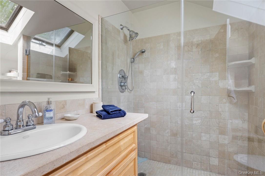 1282 Hollow Road Clinton Corners, NY 12514 - Photo 16 of 34 a bathroom with a sink and a mirror