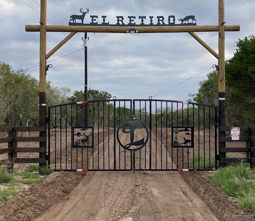 218 Cr 218 Road Encino, TX 78353 - Photo 2 of 16 a view of street with iron fence