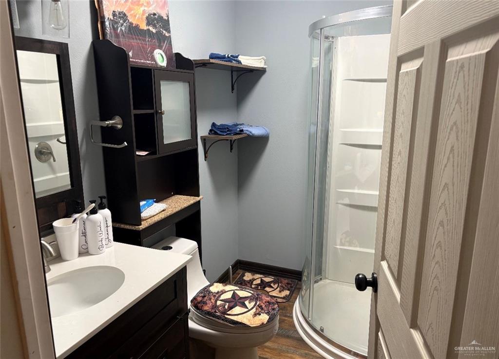 218 Cr 218 Road Encino, TX 78353 - Photo 9 of 16 a bathroom with a sink toilet and shower