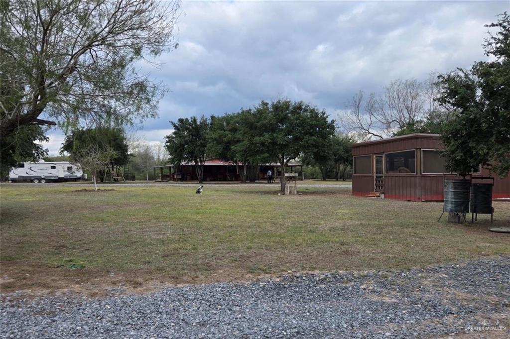218 Cr 218 Road Encino, TX 78353 - Photo 10 of 16 a view of a house with a yard