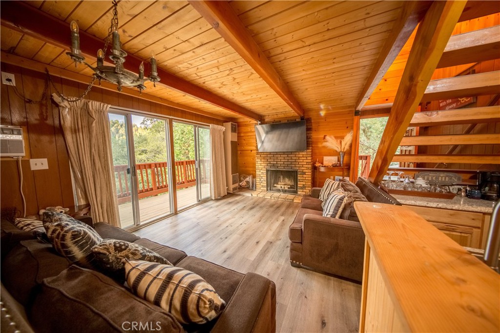512 Shady Dell Crestline, CA 92325 - Photo 12 of 42 a view of a living room and a couch