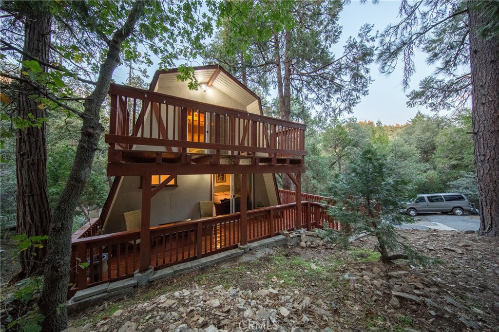 512 Shady Dell Crestline, CA 92325 - Photo 33 of 42 a view of a wooden house with large trees