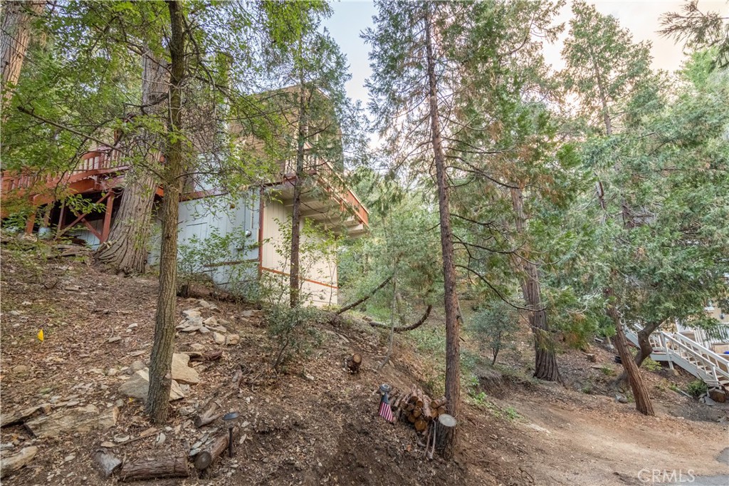 512 Shady Dell Crestline, CA 92325 - Photo 35 of 42 a backyard of a house with lots of green space