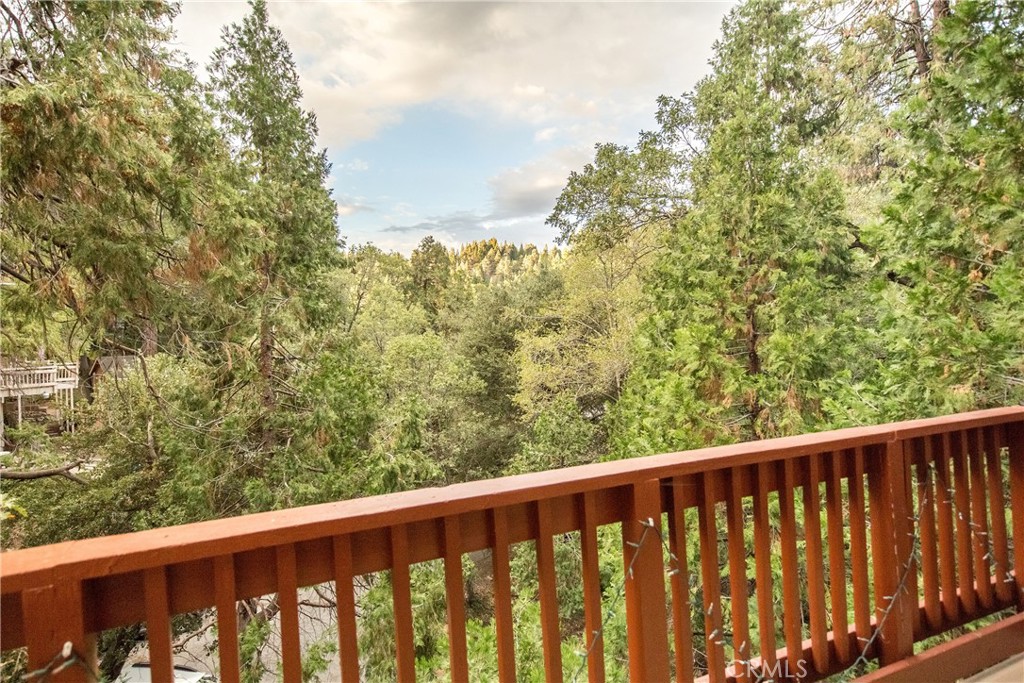 512 Shady Dell Crestline, CA 92325 - Photo 8 of 42 a view of a balcony with outdoor space