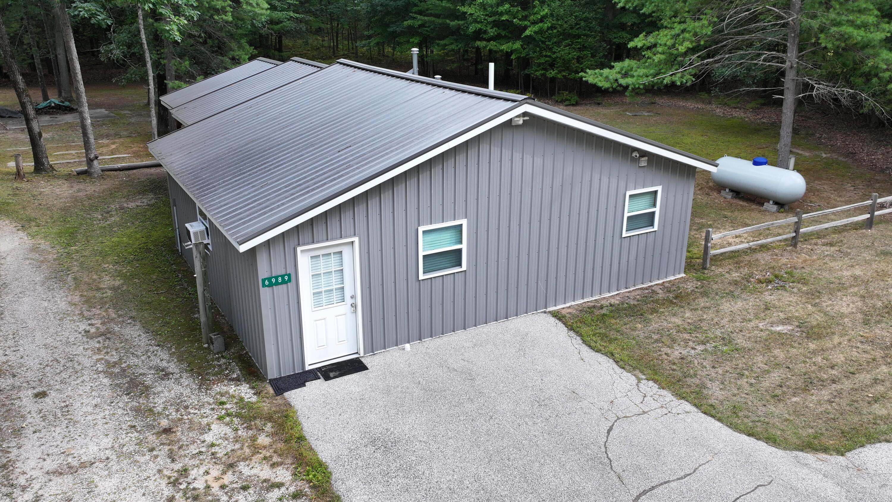 9232 West 7 Mile Road Irons, MI 49644 - Photo 27 of 28 DJI_20260729175618_0495_D