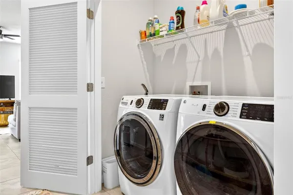 a utility room with dryer and washer