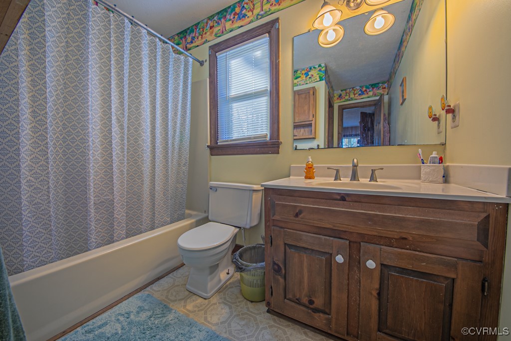 7570 Elko Road Henrico, VA 23231 - Photo 15 of 20 Full bathroom with vanity, toilet, and shower / tu
