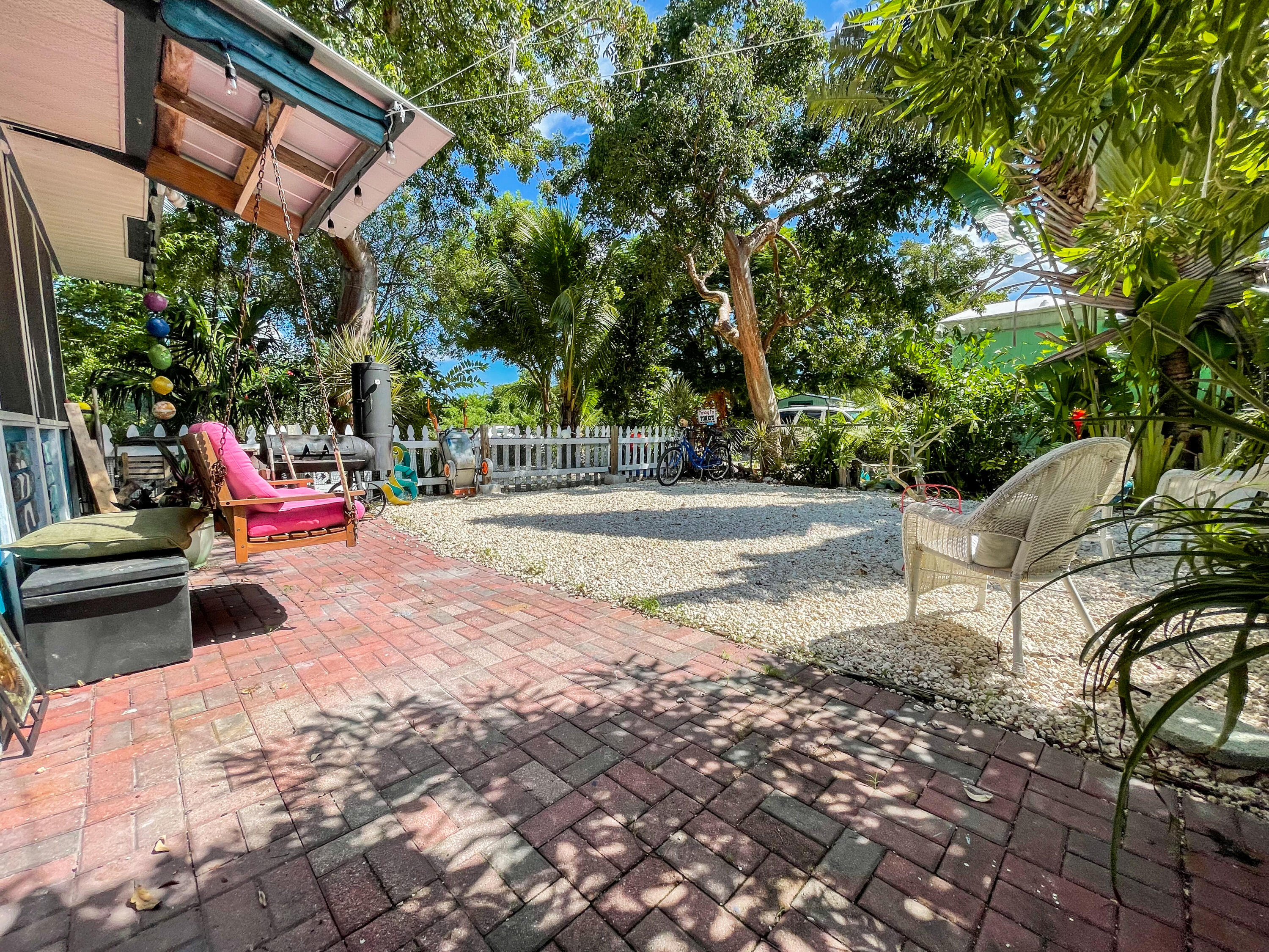 31316 Ave C Big Pine Key, FL 33043 - Photo 13 of 28 a childrens park with lots of swings and slides