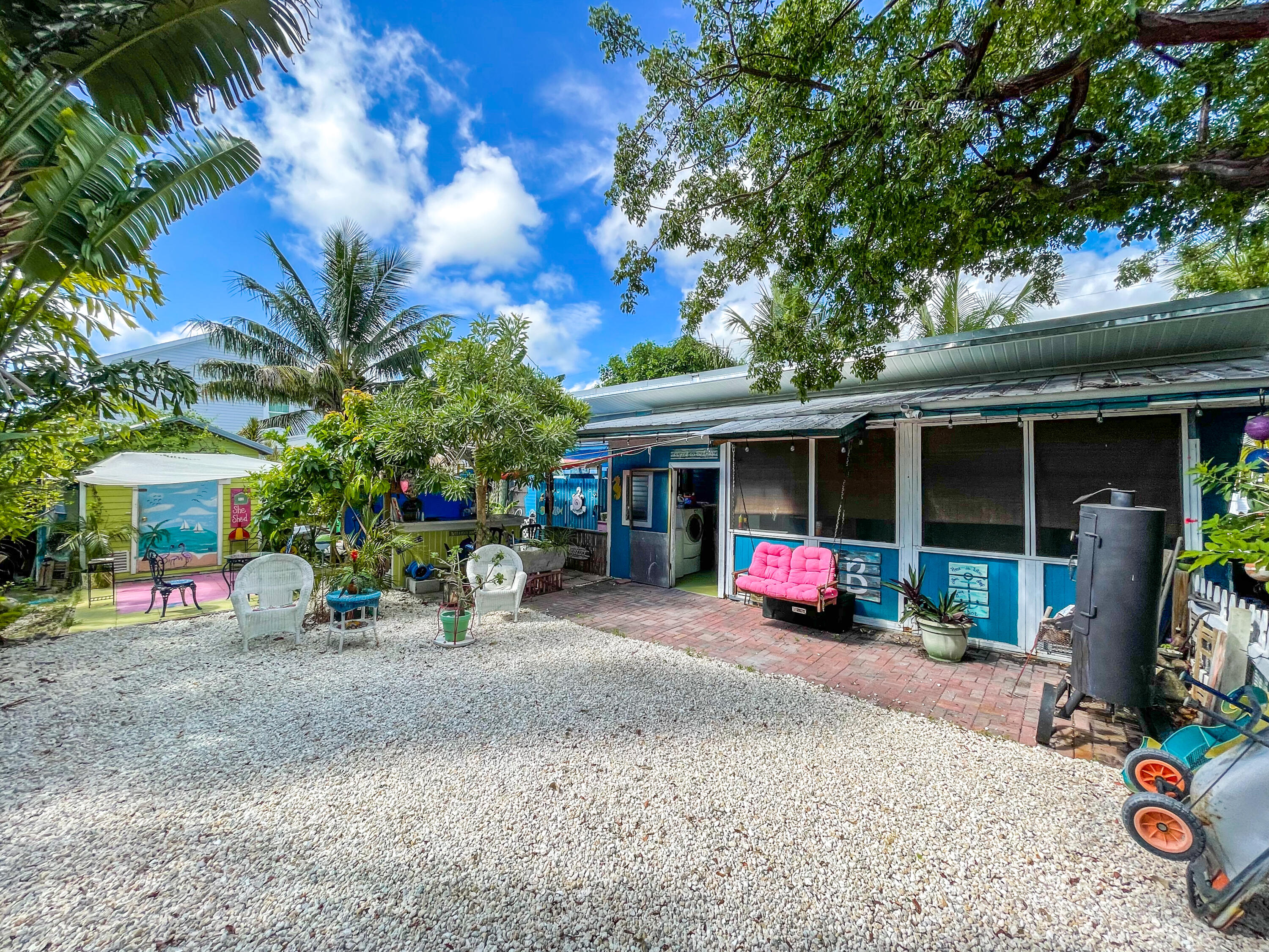31316 Ave C Big Pine Key, FL 33043 - Photo 19 of 28 a view of a car park in front of a house