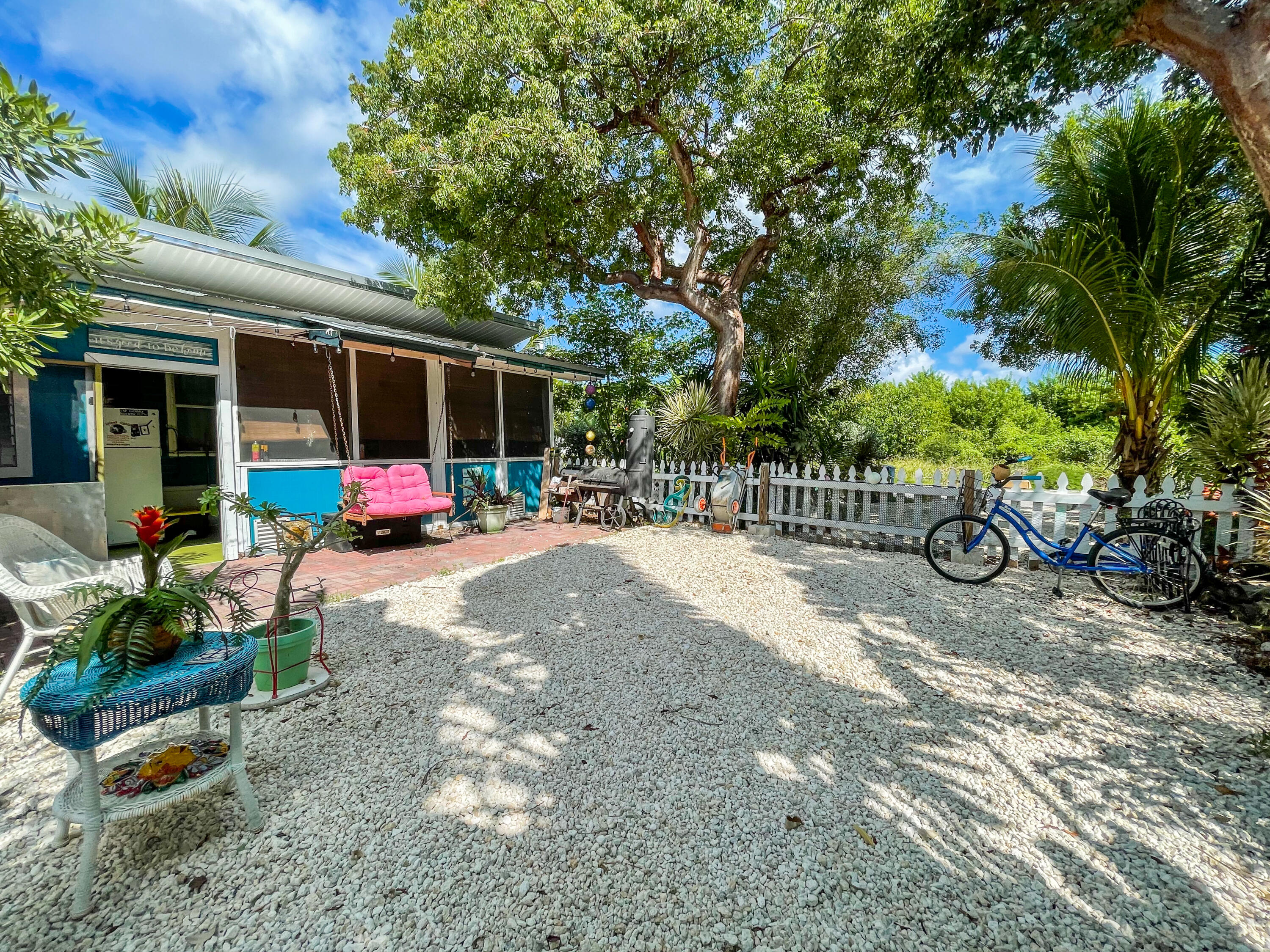 31316 Ave C Big Pine Key, FL 33043 - Photo 20 of 28 a view of outdoor space with garden and entertaining space