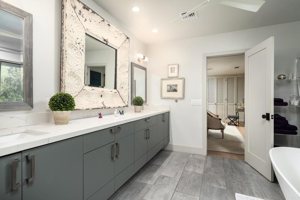 6148 El Tordo Rancho Santa Fe, CA 92067 - Photo 13 of 25 a spacious bathroom with a double vanity sink mirror and toilet