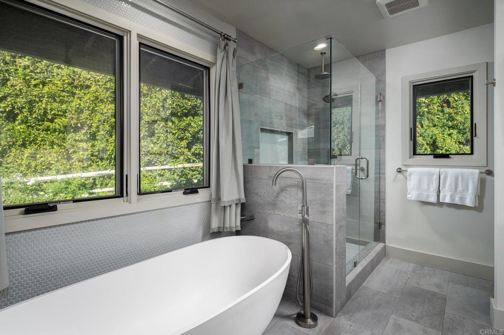 6148 El Tordo Rancho Santa Fe, CA 92067 - Photo 14 of 25 a bathroom with a bathtub and a shower