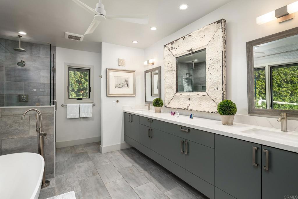 6148 El Tordo Rancho Santa Fe, CA 92067 - Photo 15 of 25 a bathroom with a double vanity sink toilet and shower