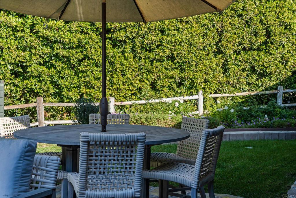 6148 El Tordo Rancho Santa Fe, CA 92067 - Photo 20 of 25 a front view of a house with a yard