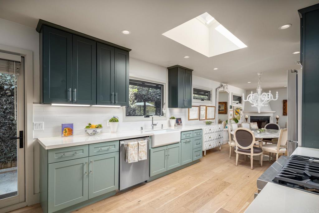 6148 El Tordo Rancho Santa Fe, CA 92067 - Photo 7 of 25 a kitchen with a sink cabinets and window