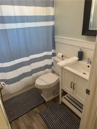 a bathroom with a sink and a toilet