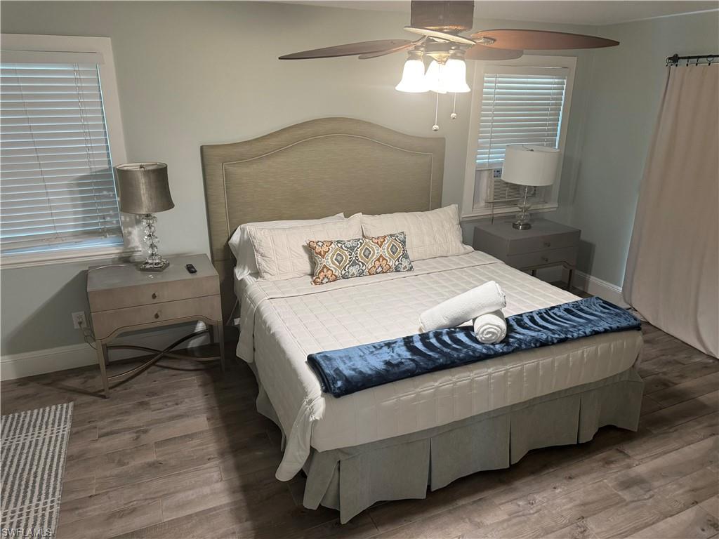 981 8th Terrace North Naples, FL 34102 - Photo 13 of 13 a bedroom with a bed and window