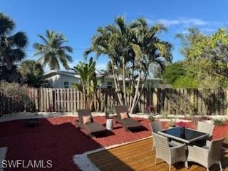 981 8th Terrace North Naples, FL 34102 - Photo 7 of 13 a view of outdoor space with seating area