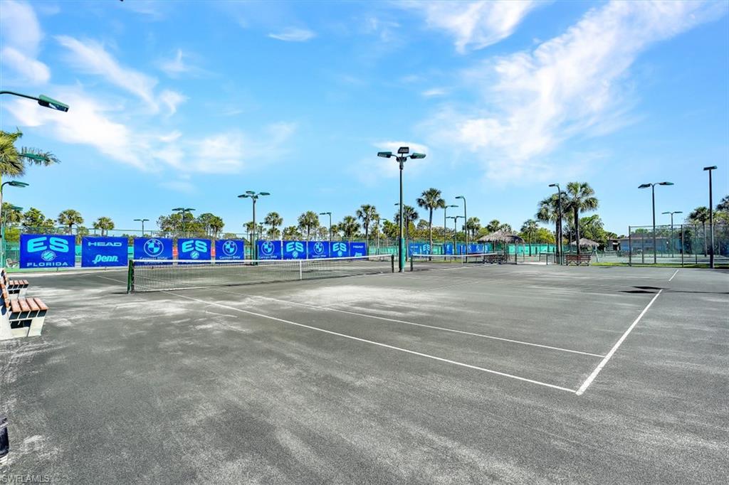 1617 Spoonbill Lane, Unit 1617 Naples, FL 34105 - Photo 29 of 31 a view of a tennis court