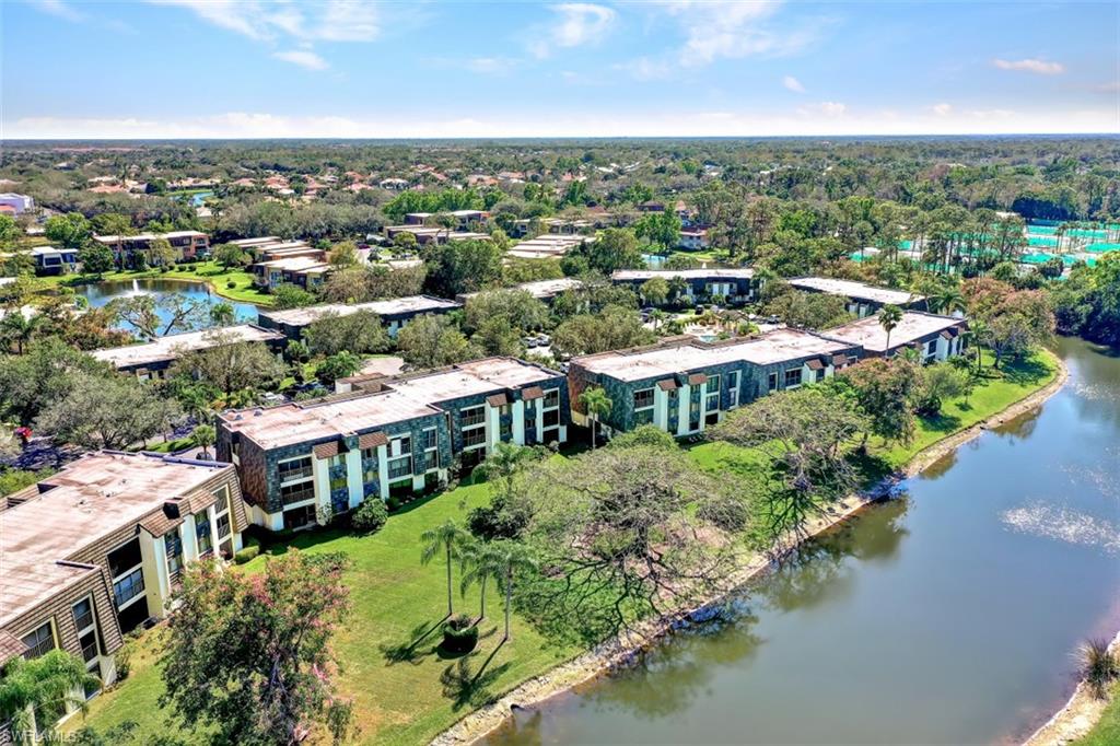 1617 Spoonbill Lane, Unit 1617 Naples, FL 34105 - Photo 31 of 31 an aerial view of multiple house