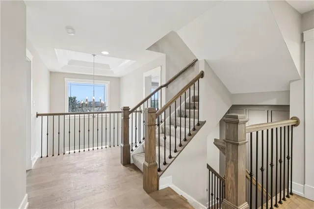 a view of staircase with lots of wooden floor