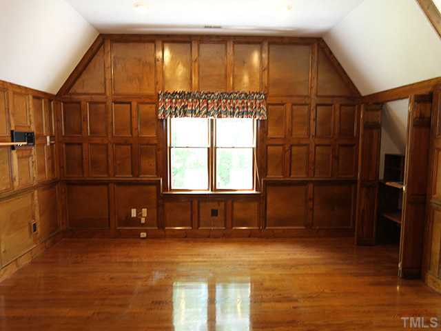 5205 Blue Stem Court Raleigh, NC 27606 - Photo 16 of 23 Rich Wood Paneling Makes this Room Handsome and Warm Studio/Study/Office