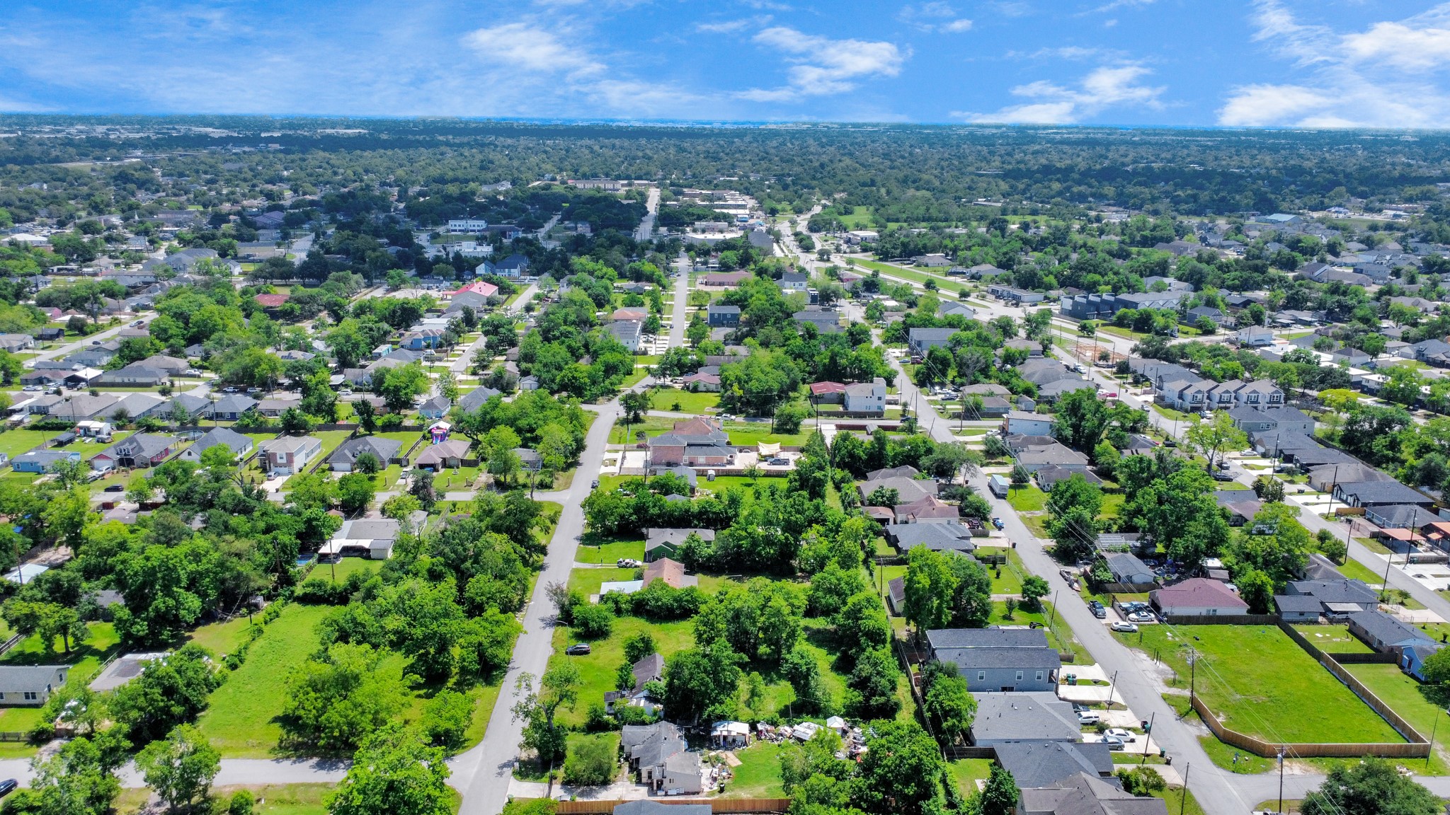 4312 Sunflower Street Houston, TX 77051 - Photo 20 of 45 an aerial view of residential houses with outdoor space and trees