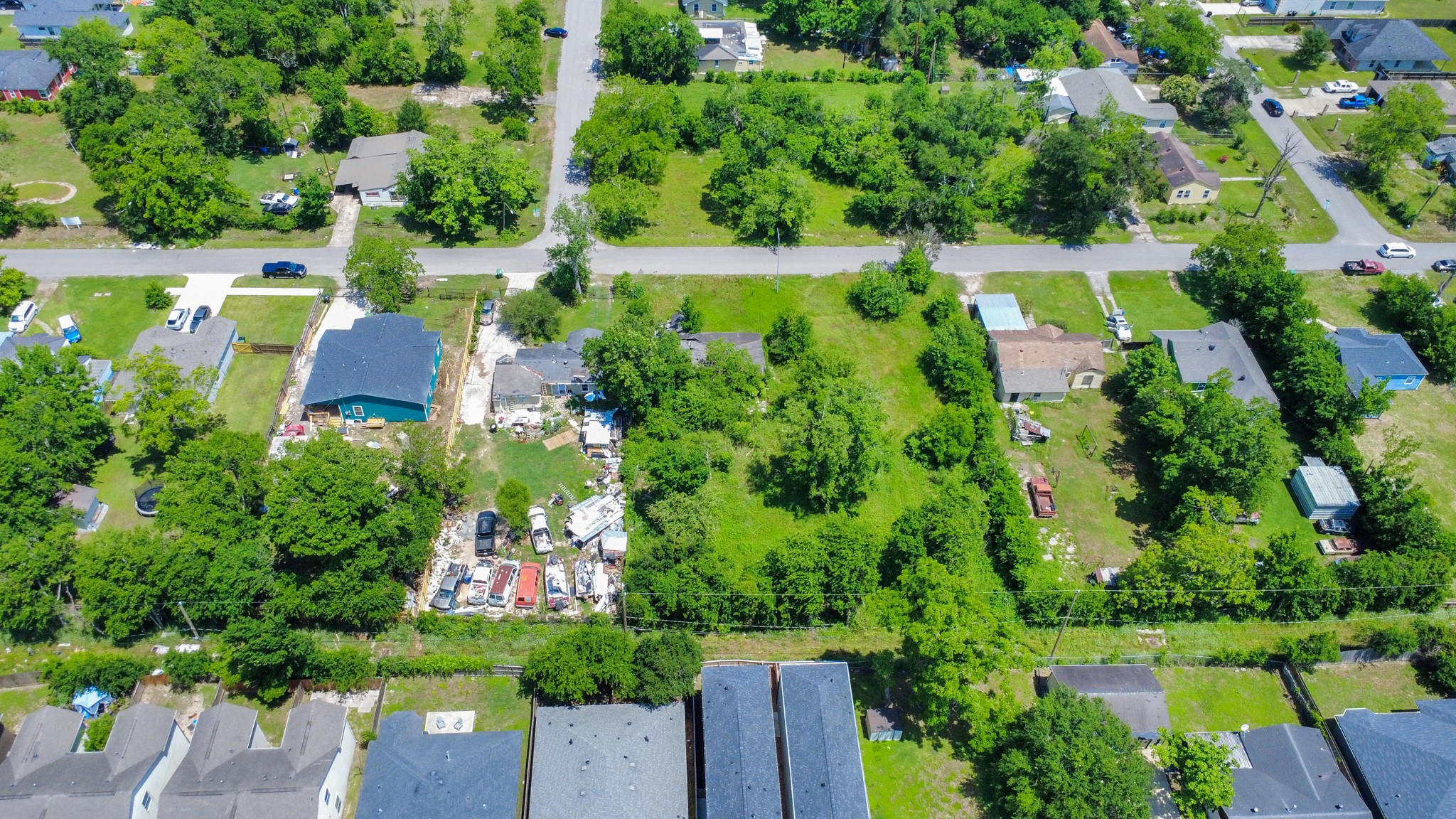 4312 Sunflower Street Houston, TX 77051 - Photo 4 of 45 an aerial view of a house with a yard and lake view
