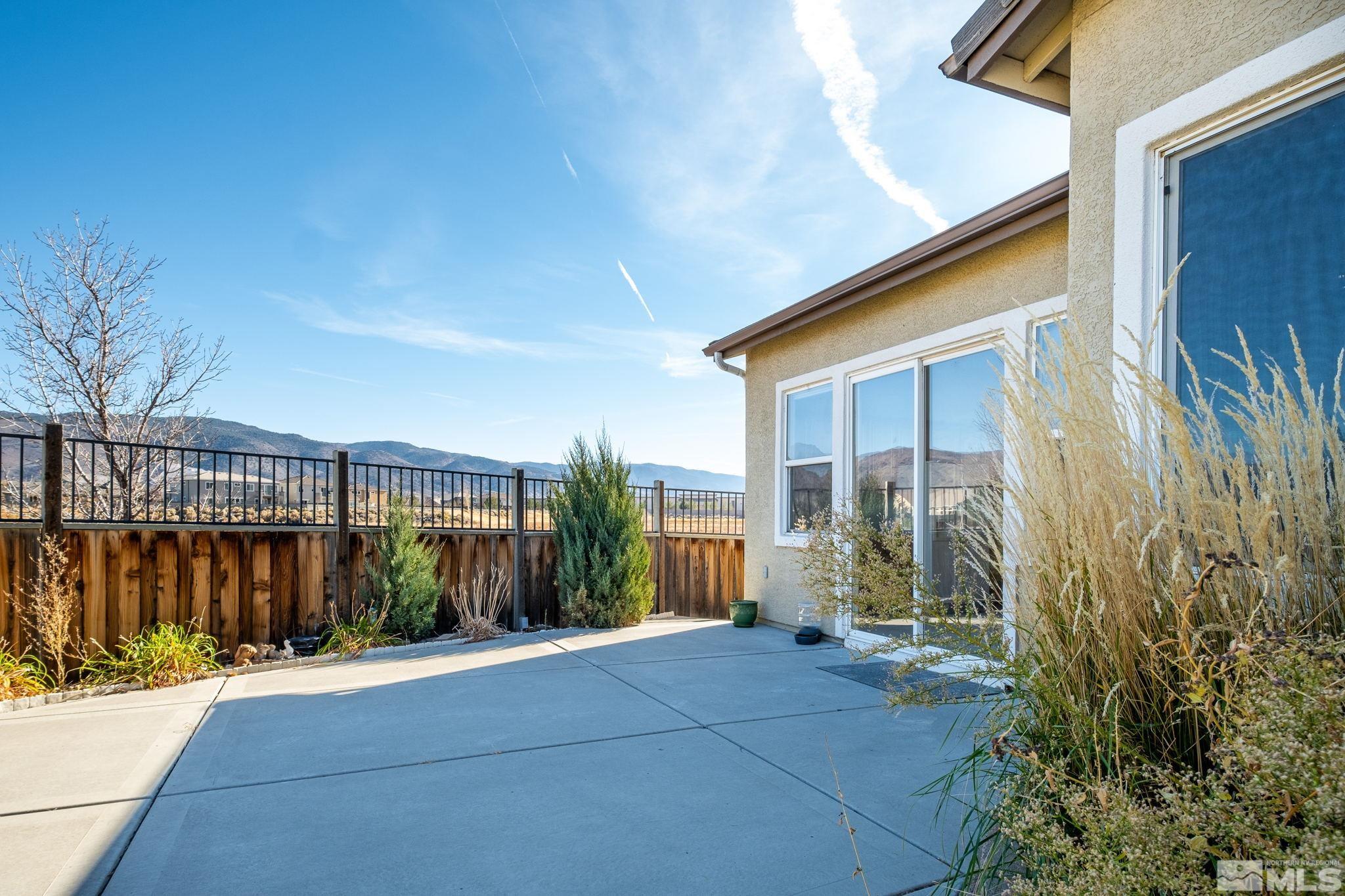 1831 Emerald Bay Drive Reno, NV 89521 - Photo 28 of 34 a view of a house with a yard