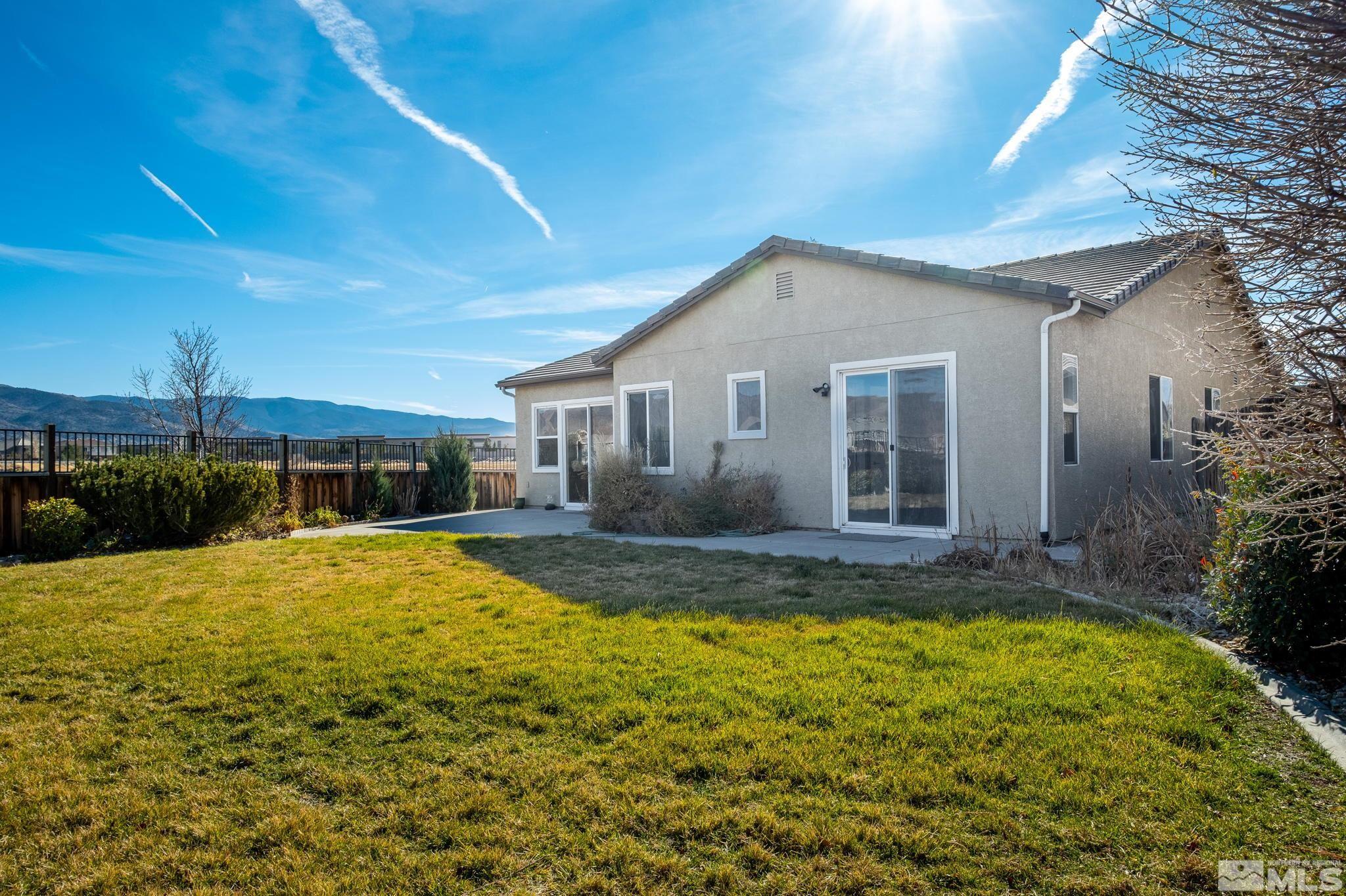 1831 Emerald Bay Drive Reno, NV 89521 - Photo 29 of 34 a view of a house with swimming pool
