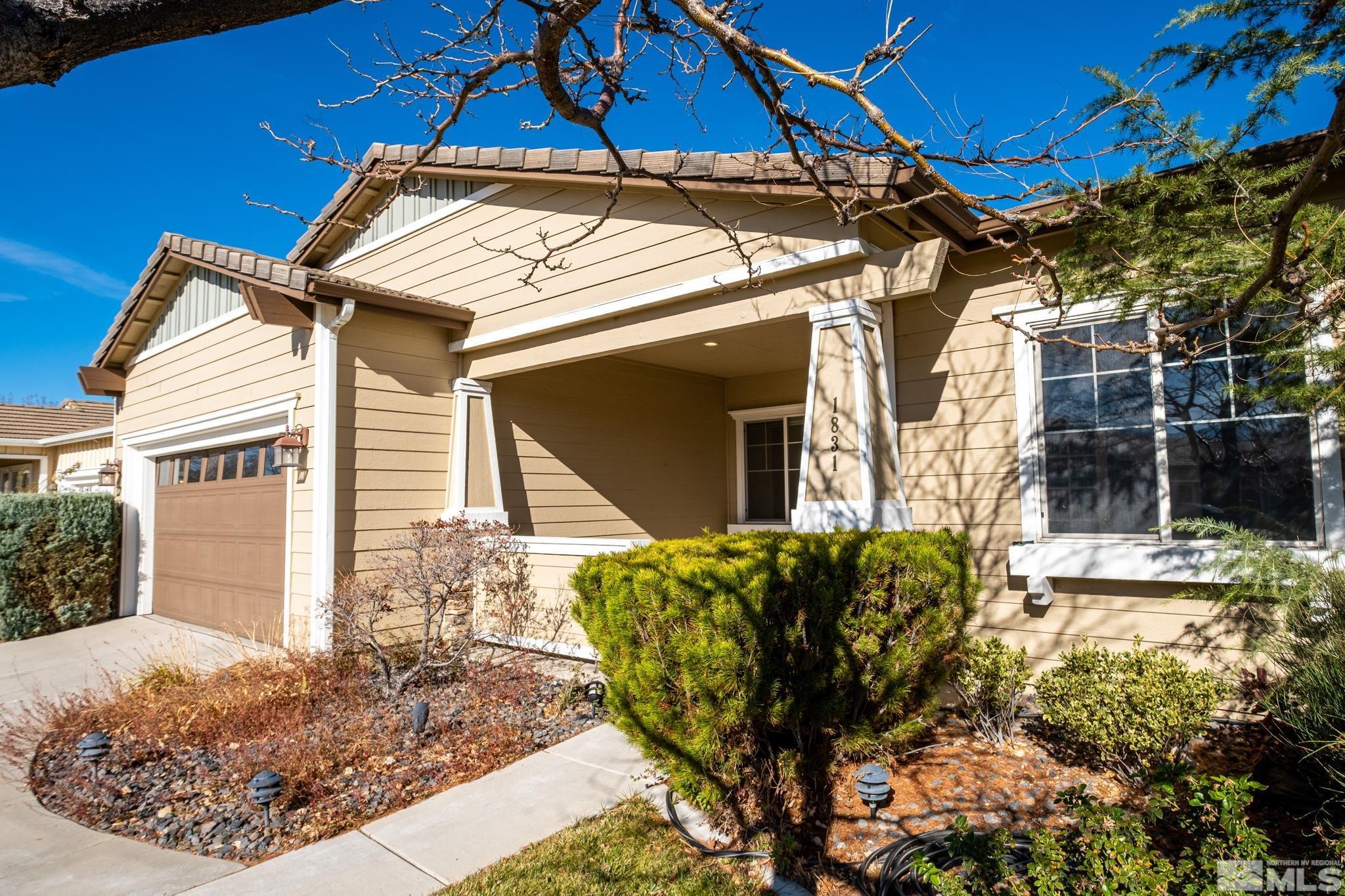 1831 Emerald Bay Drive Reno, NV 89521 - Photo 3 of 34 a view of a house with a yard