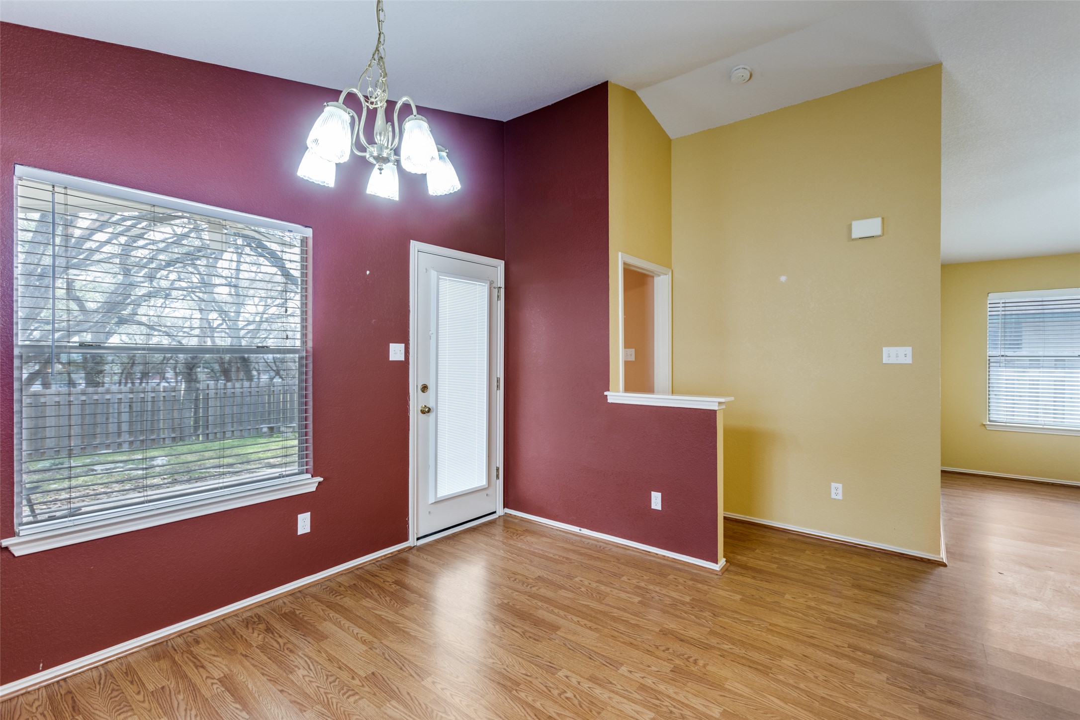 9057 Vigen Circle Austin, TX 78748 - Photo 11 of 27 a view of livingroom with window and wooden floor