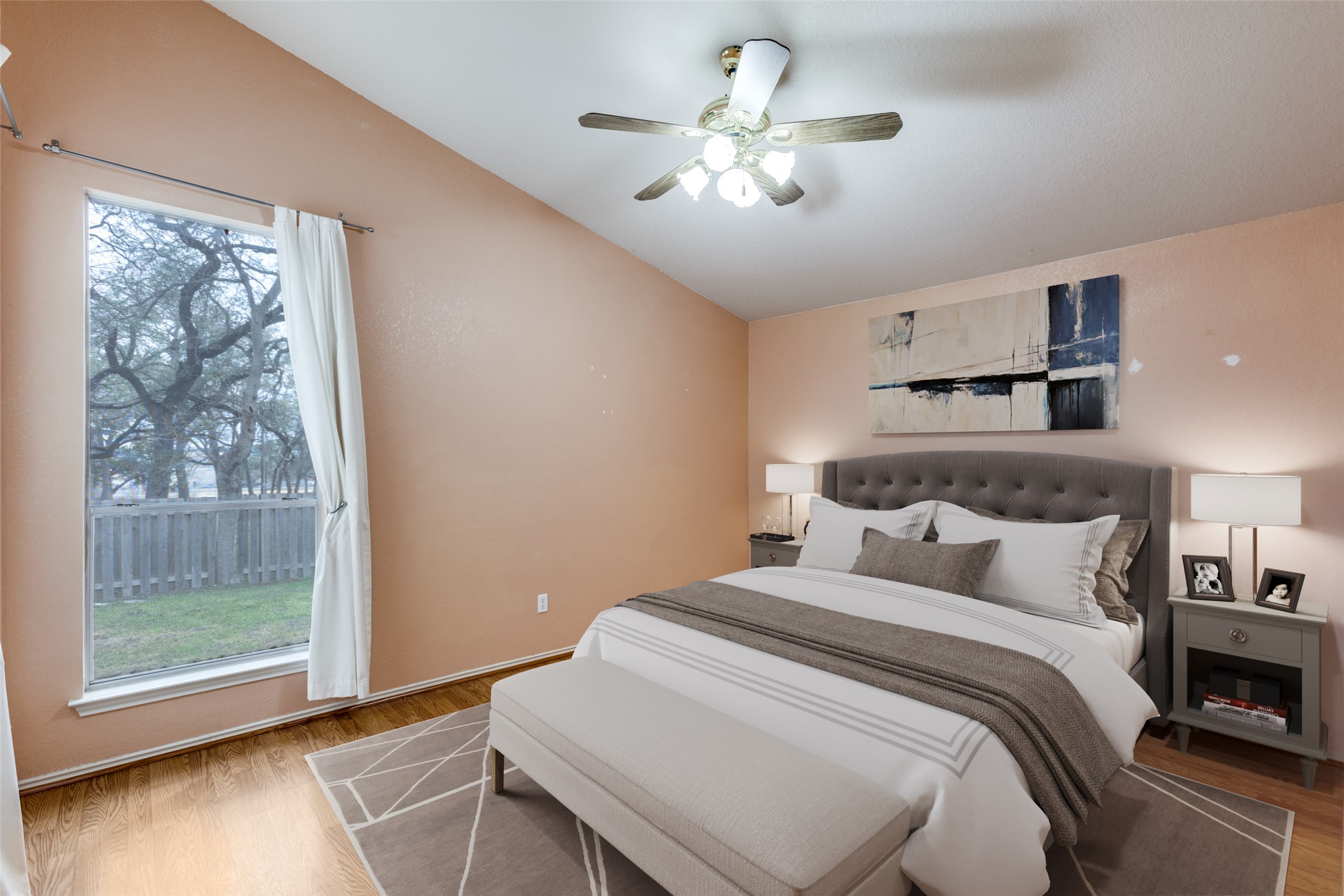 9057 Vigen Circle Austin, TX 78748 - Photo 15 of 27 a bedroom with a large bed and a chandelier