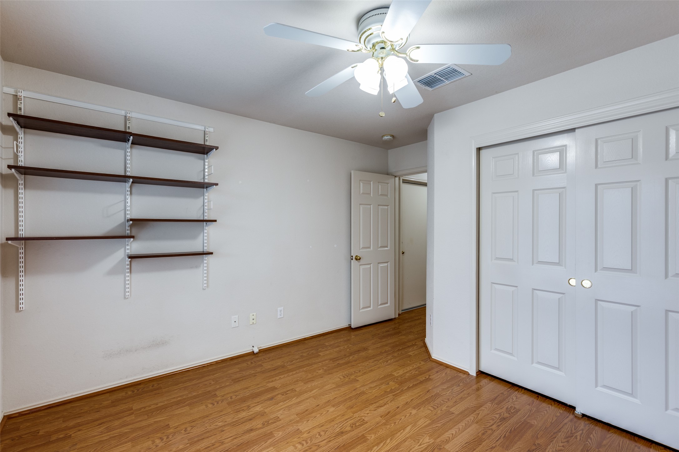 9057 Vigen Circle Austin, TX 78748 - Photo 22 of 27 wooden floor in an empty room