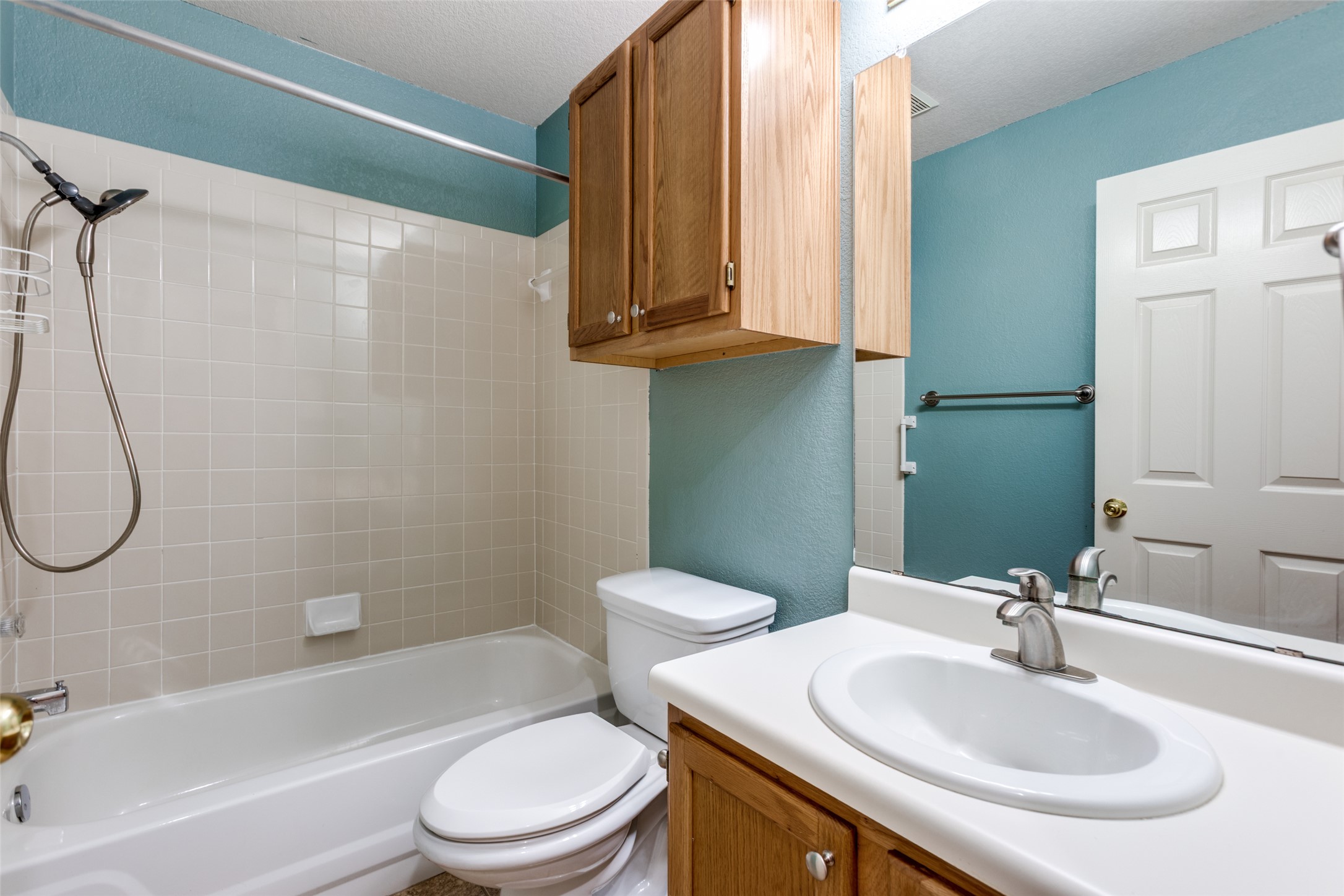 9057 Vigen Circle Austin, TX 78748 - Photo 23 of 27 a bathroom with a sink toilet and shower