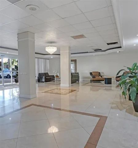 a room with a window and a sink