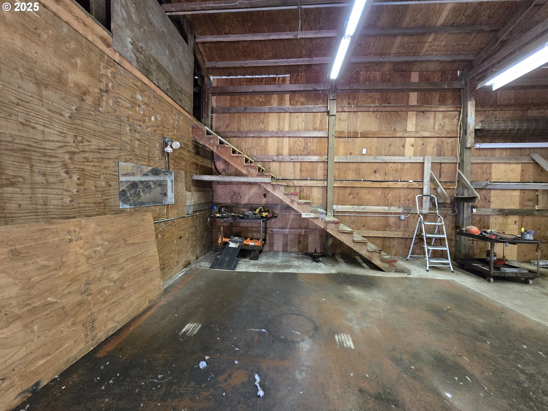 38115 Scravel Hill Road Northeast Albany, OR 97322 - Photo 41 of 46 a view of a garage with parked cars